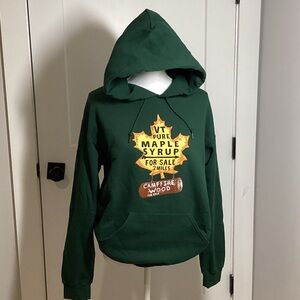 Kiel James Patrick Green Hoodie with Maple Syrup Graphic